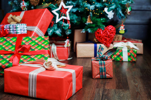 istock Christmas tree and gifts 869984262