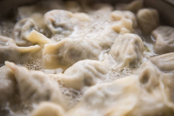 The dumplings are in the pot.