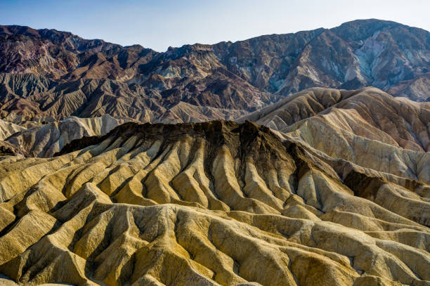 istock Zabriskie Point sunset with sky in Death Valley National Park Ca 869995436