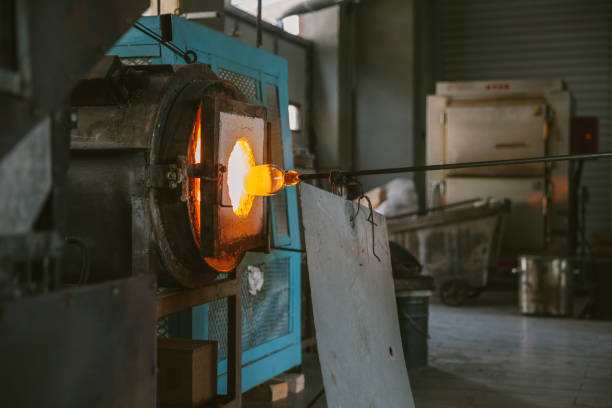istock Close up of molten glass being shaped before being blown 869996418