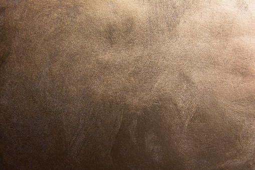 Fondo de textura de bronce degradado oscuro photo