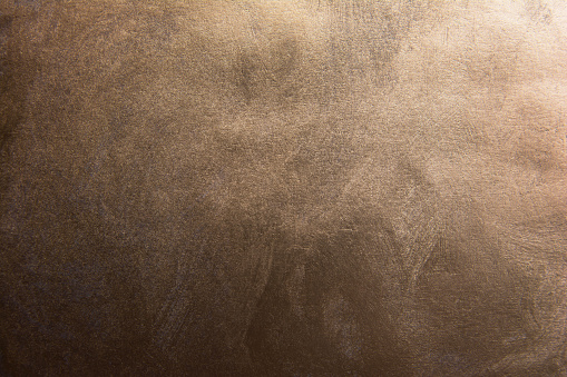 Dark gradient bronze texture background