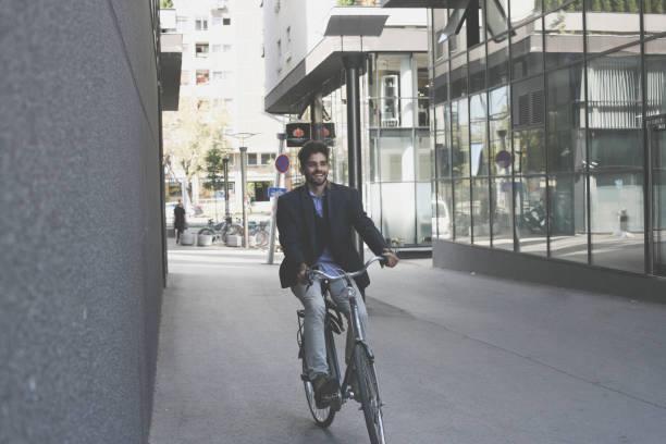 istock Enjoying on bike after work. Space for copy. 870020238