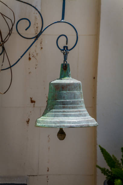 istock Old bronze bell with patina 870022904