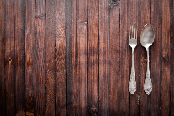 istock Old cutlery. On Wooden background. Top view. 870023346