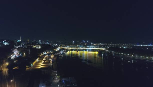 istock River and bridge at night aerial 870030222