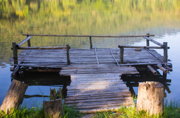istock Waterside wood pier made of bamboo 870041692