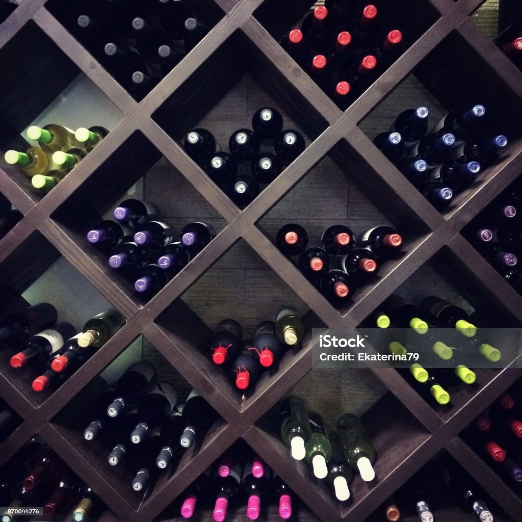 Wine bottles on the shelves Wine Stock Photo