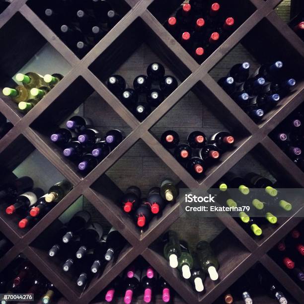 Wine Bottles On The Shelves Stock Photo - Download Image Now - Wine, Cellar, Wine Bottle