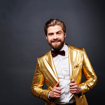 Portrait of man in golden suit