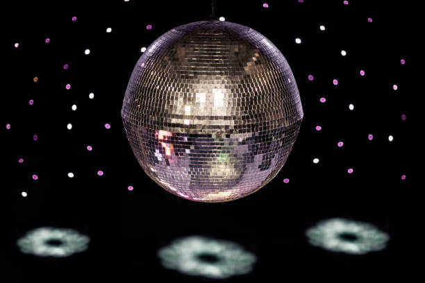 istock Disco ball on light shapes - Music background 870048560