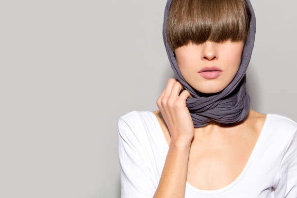 istock Woman wearing scarf and long fringe 870053652