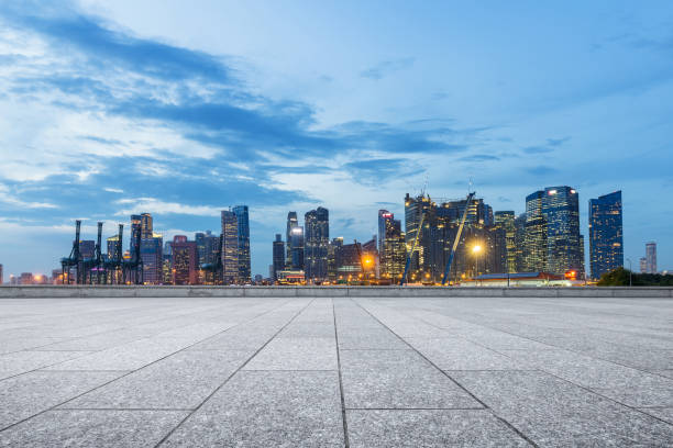 istock empty marble floor with modern city at twilight 870056202