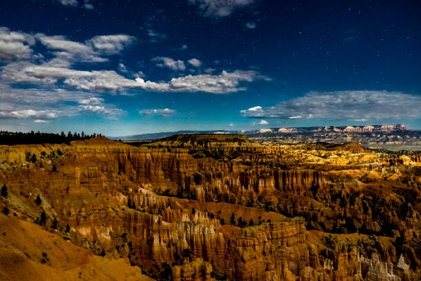 istock Night photography Bryce Canyon with moonlight and sky stars and 870056850