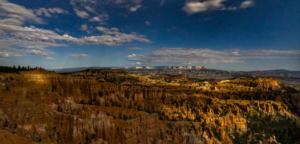 istock Night photography Bryce Canyon with moonlight and sky stars and 870056932