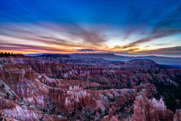 istock Sunrise over Bryce Canyon with clouds stunstar skyover Bryce Amp 870057290