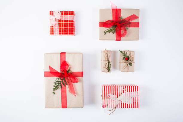 istock Christmas composition. Gift, christmas decoration, cypress branches, pine cones on white background 870061252