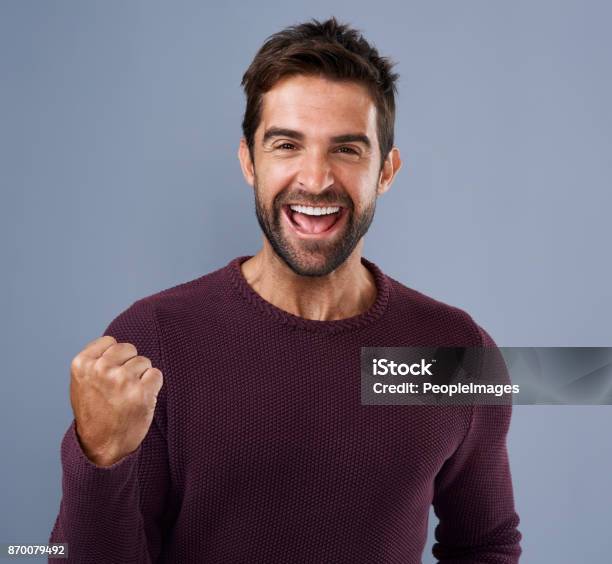 Nothing Feels As Good As Winning Stock Photo - Download Image Now - Men, Ecstatic, Excitement