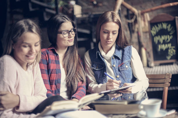 istock Students girls learning together. Close up. 870090740