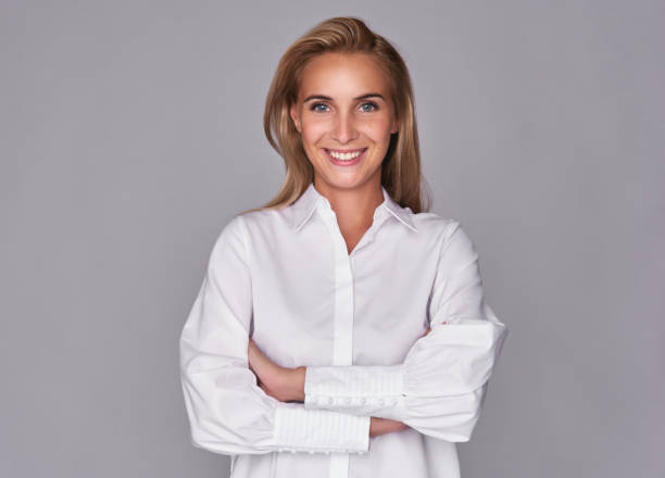 istock toothy smiling young pretty woman 870096220