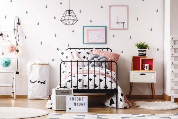 istock Pastel pillows on girl's bed 870110404
