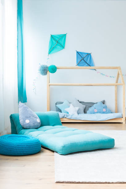 istock Blue pouf in boy's bedroom 870118710