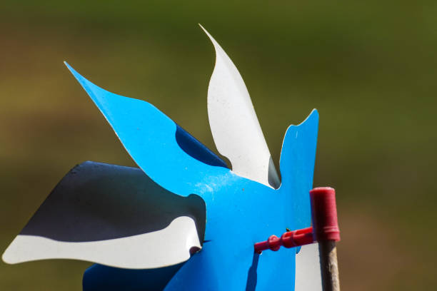istock toy pinwheel in windy weather 870119280