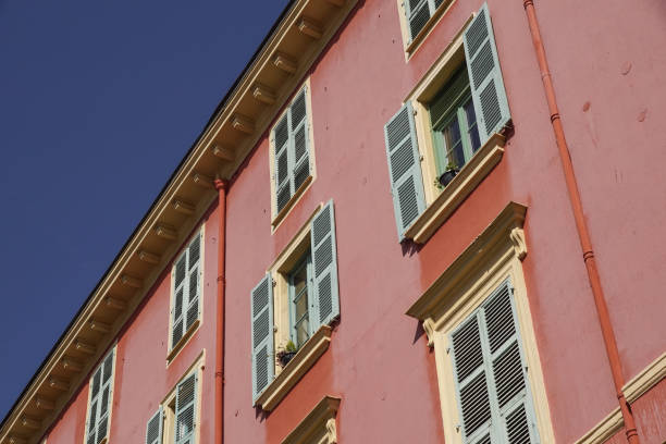 istock Pink building with blue sky for background 870122694