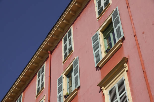 istock Pink building with blue sky for background 870122778