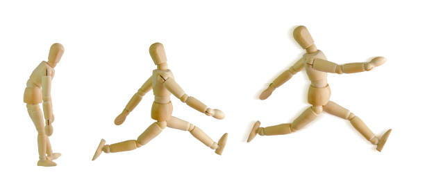 istock wooden figure mannequin running isolated on white 870123352