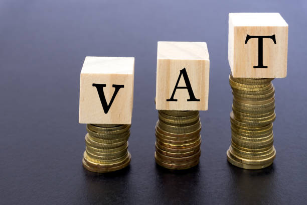 istock VAT Word on Wood Block on Top of Coins Stack 870125694