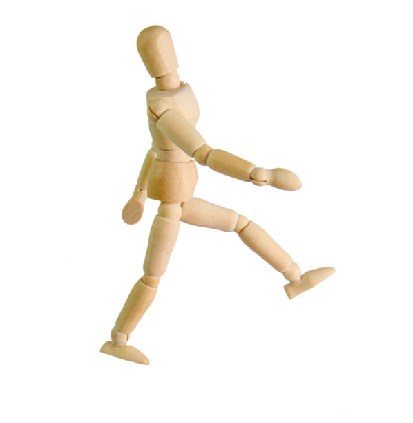istock wooden figure mannequin running isolated on white 870126140