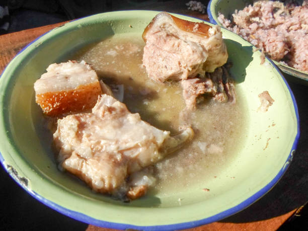 istock Malagasy dish: fat pork meat with pink rice 870126804