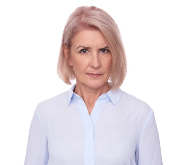 istock serious old business woman isolated 870133854