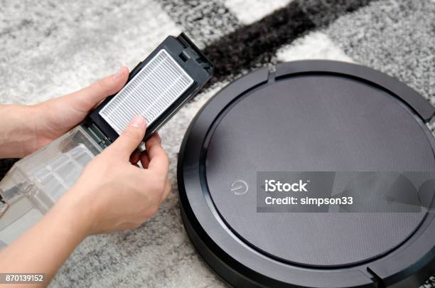 Robotic Vacuum Cleaner Maintenance Stock Photo - Download Image Now - HEPA Filter, Cleaner, Appliance