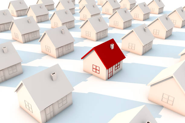 istock 3d illustration red house among white housese 870154542