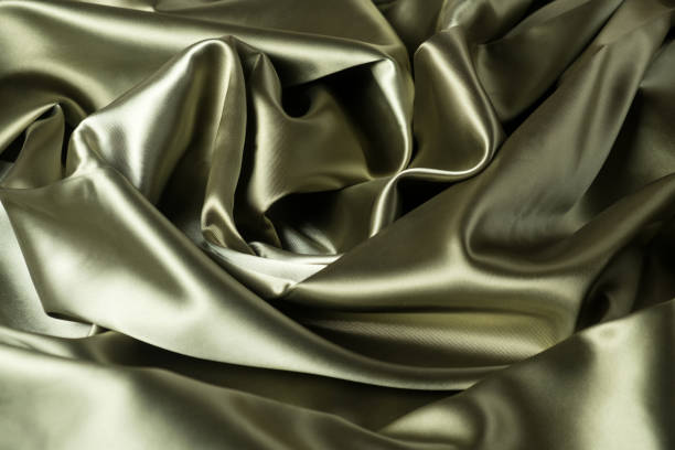 istock A full page close up of grey silk material texture 870157512