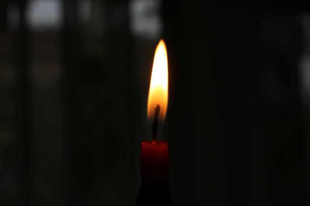 istock Hope of candle light 870164818