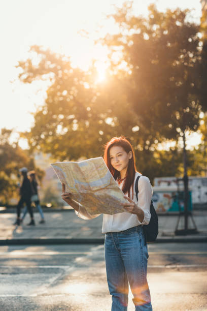 Travel Young beautiful female traveler lost in the city 3686 stock pictures, royalty-free photos & images