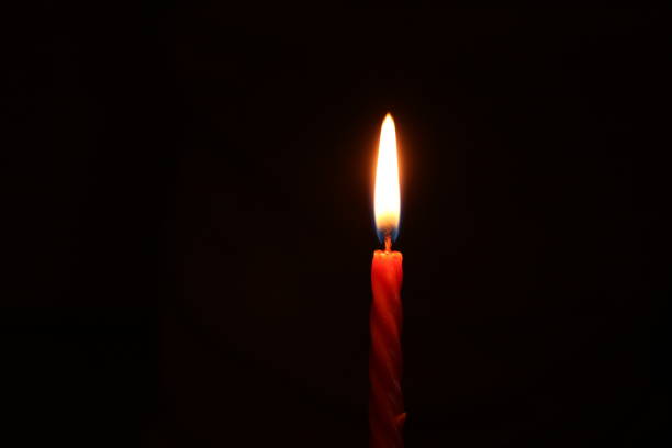 istock Hope of candle light 870176116
