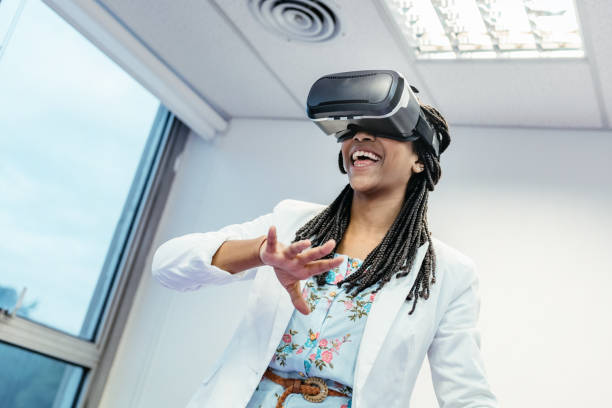 istock young brazilian businesswoman testing virtual reality simulator indoors 870180052