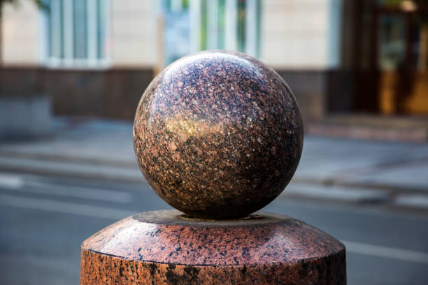 istock Sphere ball stone Bollards of marble chips 870183314
