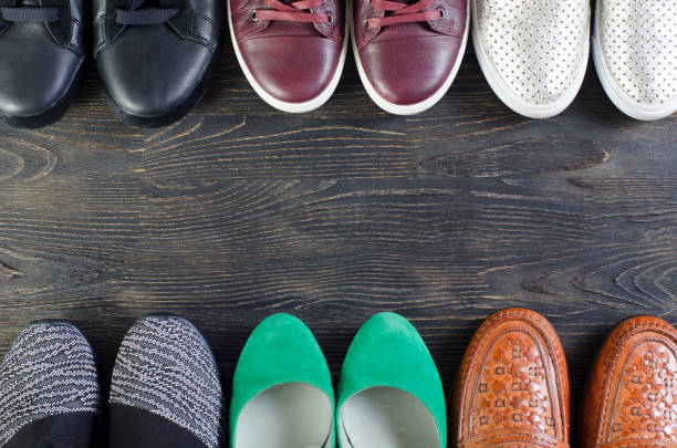 istock shoes on a wooden background 870183372