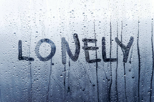 istock The inscription lonely on the sweaty glass. 870186072