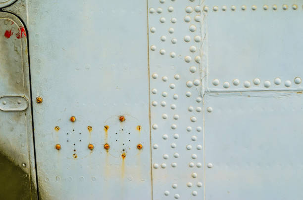 istock Old aircraft fuselage close up. 870192286