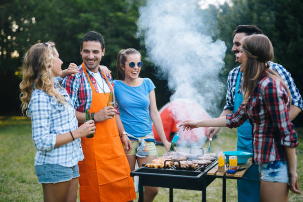 istock Friends enjoying bbq party 870192792