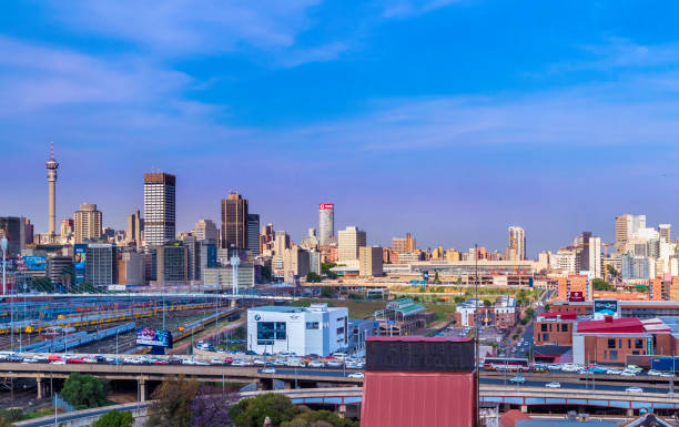 Johannesburg afternoon cityscape highway traffic stock photo