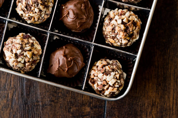 istock Box of Chocolate Pralines with Hazelnuts. 870200460