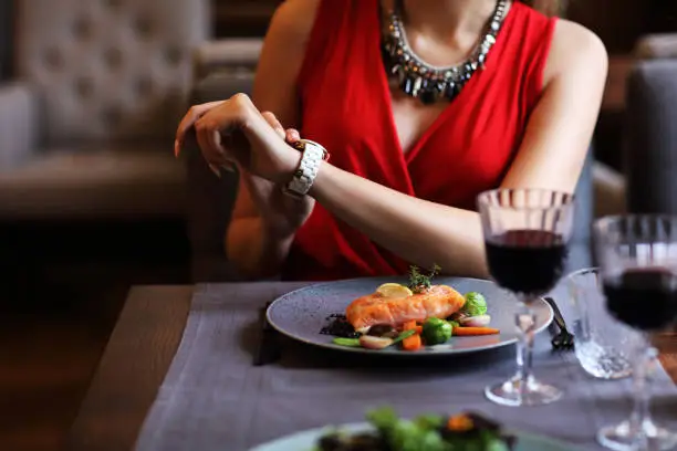 Photo of Bored Woman Alone at Restaurant