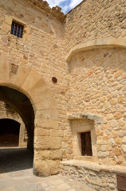 istock Stone arch in Spanish village 870203910